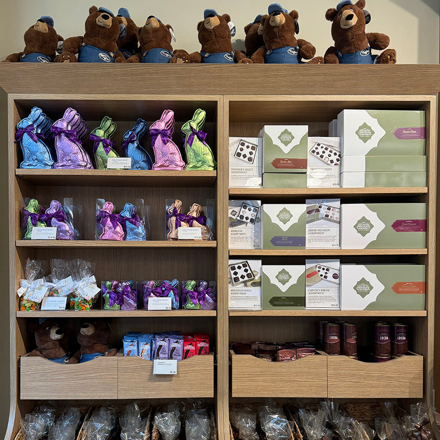 Chocolate bunnies on shelves in a Rocky Mountain Chocolate Factory store